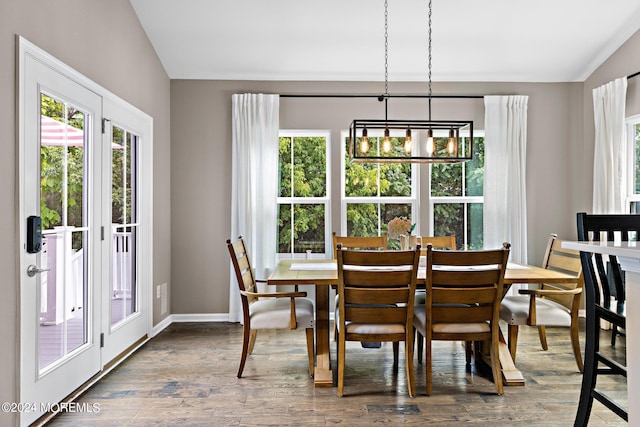 22 Imlay Ln, Farmingdale, NJ 07727 - dining space featuring dark wood-style flooring, baseboards, lofted ceiling, and a chandelier