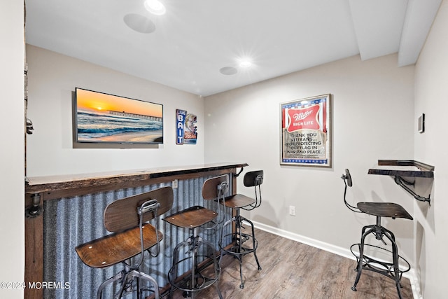 22 Imlay Ln, Farmingdale, NJ 07727 - indoor dry bar featuring wood finished floors and baseboards