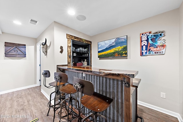 22 Imlay Ln, Farmingdale, NJ 07727 - indoor dry bar with wood finished floors, baseboards, and recessed lighting