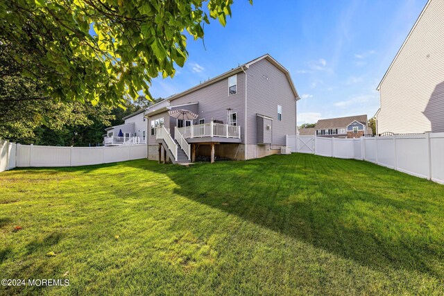 22 Imlay Ln, Farmingdale, NJ 07727 - back of property featuring a deck, stairs, and central AC