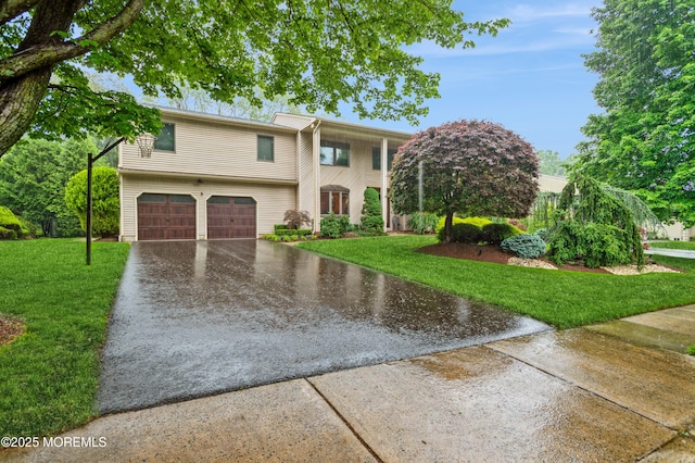 5 Stone Ln, Marlboro, NJ 07746 - view of front of home featuring an attached garage, driveway, and a front lawn