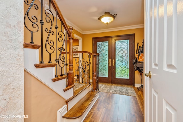 5 Stone Ln, Marlboro, NJ 07746 - foyer with french doors, wood finished floors, stairs, and ornamental molding