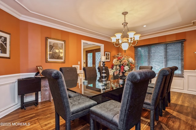 5 Stone Ln, Marlboro, NJ 07746 - dining room featuring a chandelier, ornamental molding, wainscoting, wood finished floors, and a decorative wall