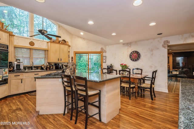 5 Stone Ln, Marlboro, NJ 07746 - kitchen featuring light brown cabinets, a sink, dark wood finished floors, recessed lighting, and a kitchen bar