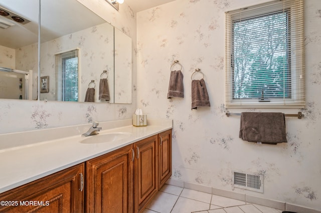 5 Stone Ln, Marlboro, NJ 07746 - bathroom featuring vanity, tile patterned flooring, a shower stall, baseboards, and wallpapered walls