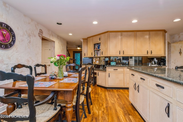 5 Stone Ln, Marlboro, NJ 07746 - kitchen featuring light brown cabinetry, light wood-style flooring, recessed lighting, a textured wall, and dark stone counters
