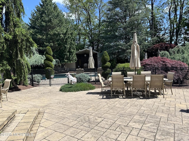 5 Stone Ln, Marlboro, NJ 07746 - view of patio / terrace with fence and outdoor dining space