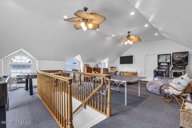 recreation room with lofted ceiling, ceiling fan, recessed lighting, and carpet floors
