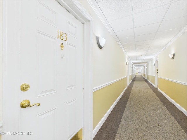 183 Liddle Ave, Edison, NJ 08837 - hallway with baseboards, a paneled ceiling, and dark colored carpet