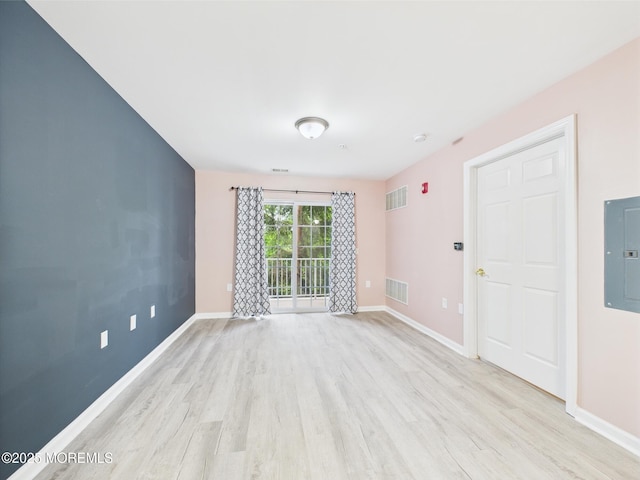 183 Liddle Ave, Edison, NJ 08837 - spare room featuring light wood-style flooring, electric panel, and baseboards