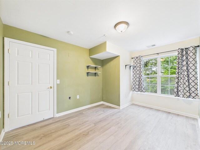 183 Liddle Ave, Edison, NJ 08837 - empty room featuring wood finished floors, baseboards, and a smoke detector