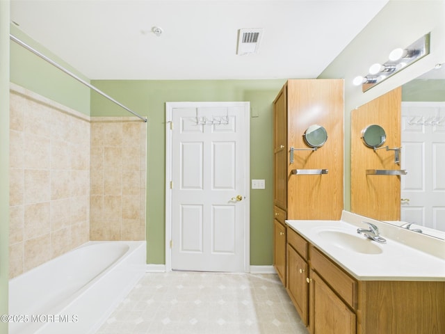183 Liddle Ave, Edison, NJ 08837 - bathroom featuring bathing tub / shower combination, vanity, baseboards, and tile patterned floors