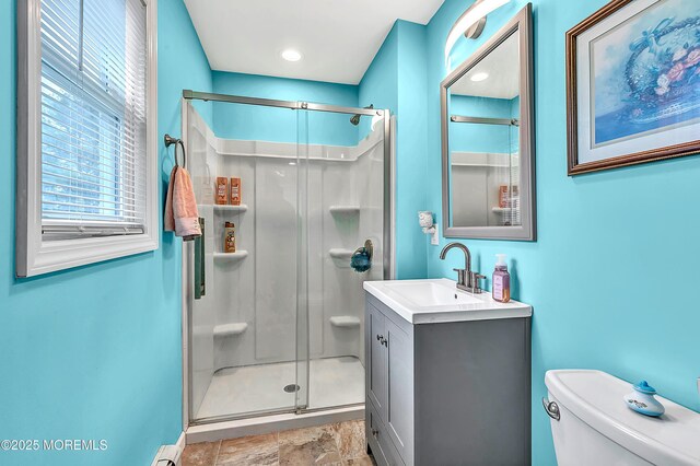 14 Santiago Dr W, Toms River, NJ 08757 - bathroom with a shower stall, vanity, toilet, and stone finish floors