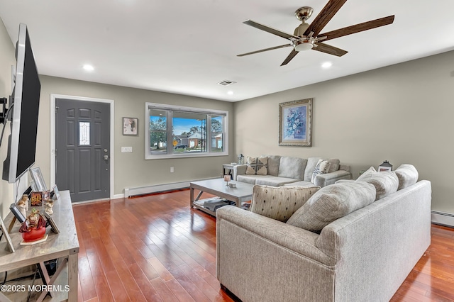 14 Santiago Dr W, Toms River, NJ 08757 - living area with baseboard heating, a ceiling fan, wood finished floors, recessed lighting, and baseboards