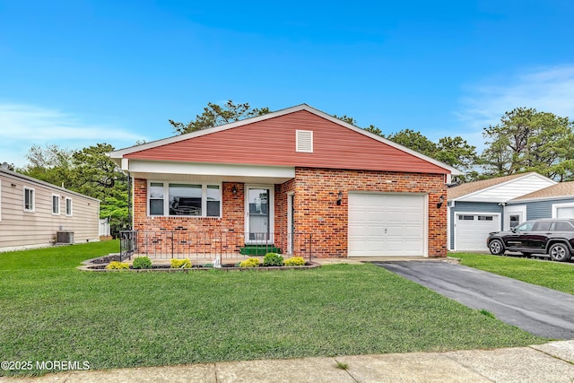 14 Santiago Dr W, Toms River, NJ 08757 - view of front of property featuring brick siding, central AC, and a front yard