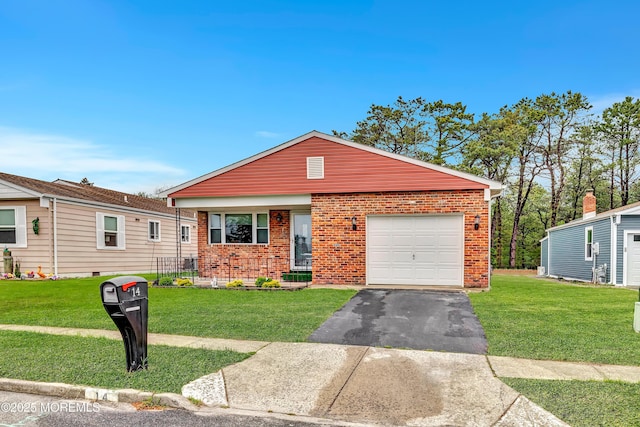 14 Santiago Dr W, Toms River, NJ 08757 - view of front facade with brick siding, asphalt driveway, a front yard, and a garage