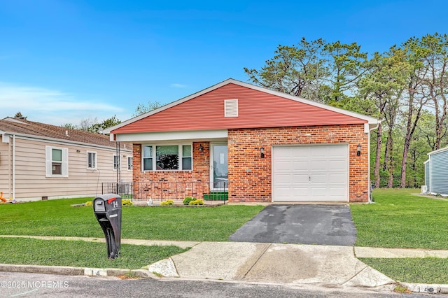 14 Santiago Dr W, Toms River, NJ 08757 - view of front of home with brick siding, asphalt driveway, a front yard, and an attached garage