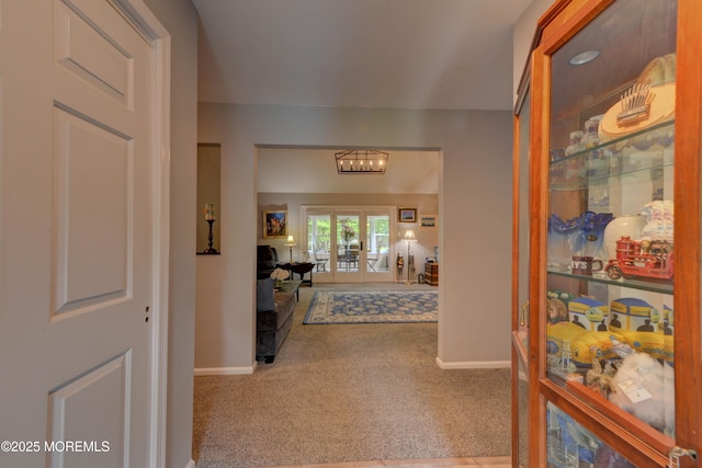4 Capewoods Rd, North Cape May, NJ 08204 - corridor featuring carpet floors, baseboards, and french doors