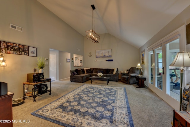 4 Capewoods Rd, North Cape May, NJ 08204 - carpeted living area with high vaulted ceiling and a chandelier