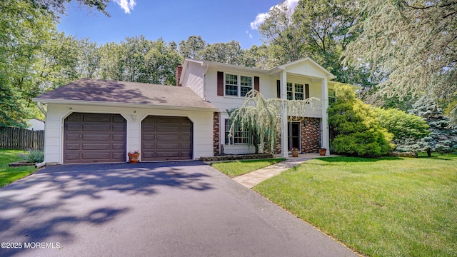 9 Toby Ter, Monroe, NJ 08831 - view of front of property with driveway, an attached garage, a chimney, and a balcony
