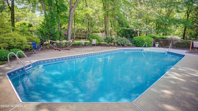 9 Toby Ter, Monroe, NJ 08831 - view of swimming pool featuring a fenced backyard, a patio, and view of scattered trees