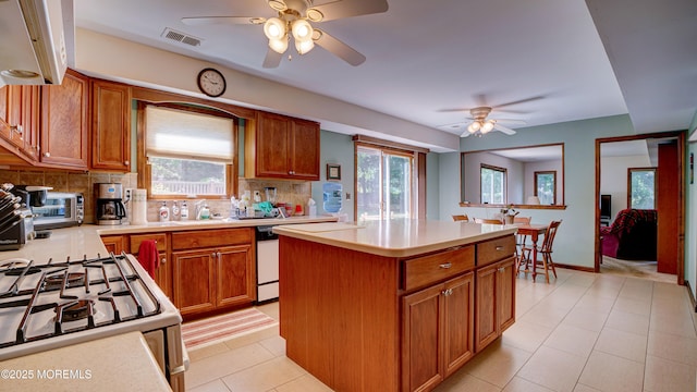 9 Toby Ter, Monroe, NJ 08831 - kitchen featuring ceiling fan, plenty of natural light, and white range with gas stovetop