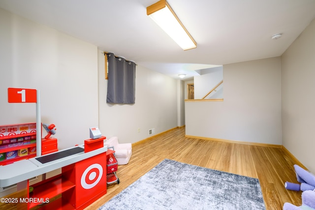 117 Waverly Pl, Howell, NJ 07731 - game room with wood finished floors and baseboards