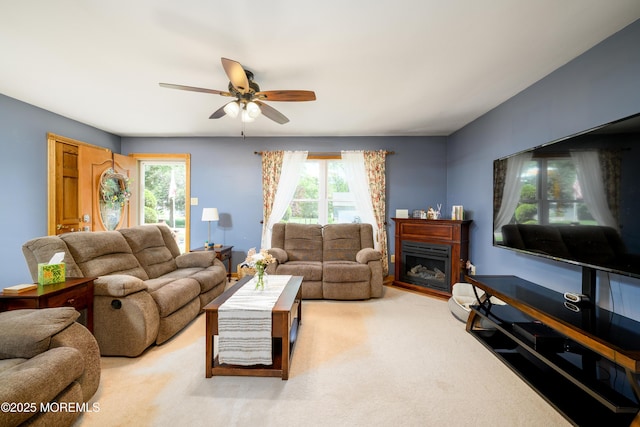 117 Waverly Pl, Howell, NJ 07731 - living room with a ceiling fan, light carpet, and a fireplace
