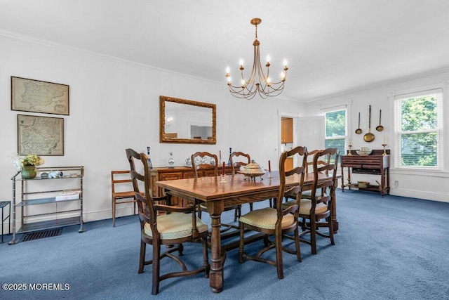 208 Ludlow Ave, Spring Lake, NJ 07762 - dining area with a chandelier, carpet flooring, crown molding, and baseboards
