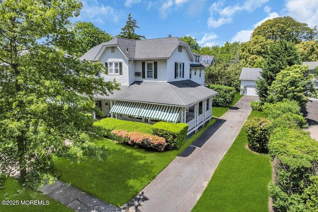 208 Ludlow Ave, Spring Lake, NJ 07762 - view of front of house with roof with shingles and a front lawn