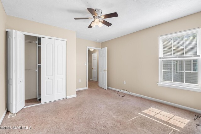 7 Sloop Sq, Freehold, NJ 07728 - unfurnished bedroom featuring carpet floors, baseboards, a closet, and ceiling fan