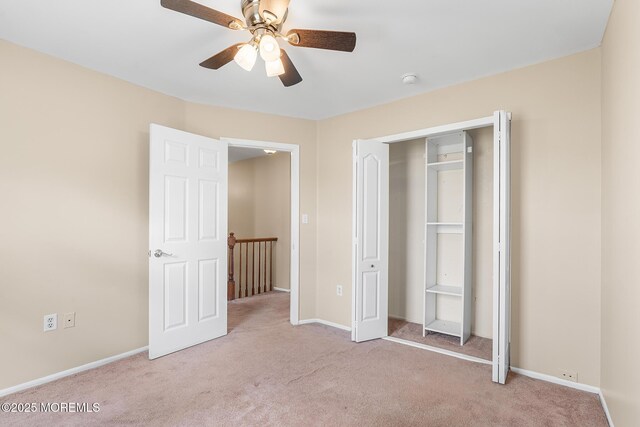 7 Sloop Sq, Freehold, NJ 07728 - unfurnished bedroom featuring carpet, baseboards, and a ceiling fan