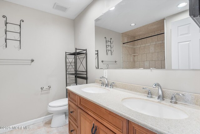 7 Sloop Sq, Freehold, NJ 07728 - full bathroom with tile patterned floors, toilet, double vanity, a tile shower, and baseboards