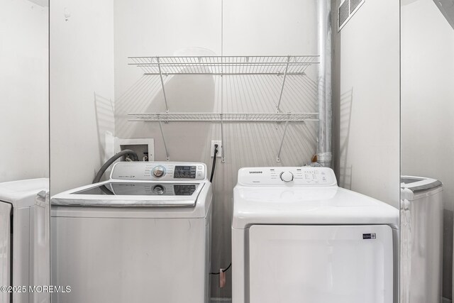 7 Sloop Sq, Freehold, NJ 07728 - laundry room with washer and clothes dryer