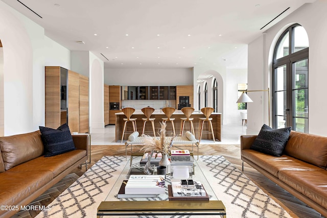 27 N Ward Ave, Rumson, NJ 07760 - living area with arched walkways and recessed lighting