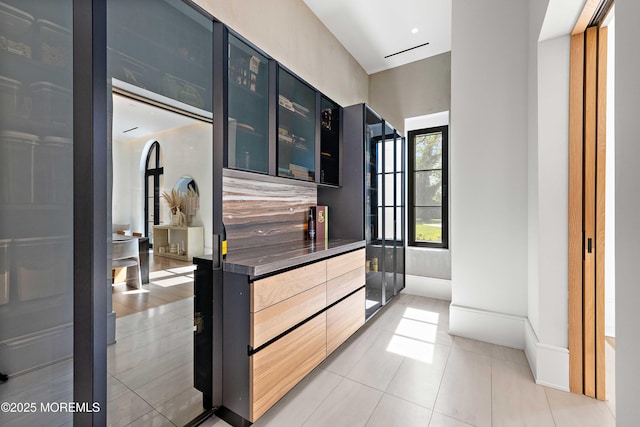 27 N Ward Ave, Rumson, NJ 07760 - hall featuring light tile patterned floors and baseboards