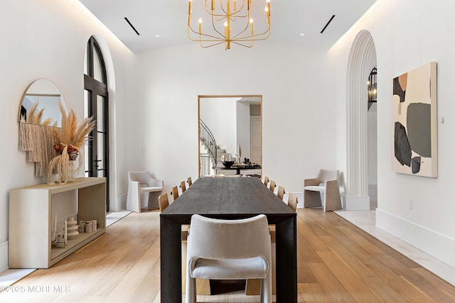 27 N Ward Ave, Rumson, NJ 07760 - dining space with stairs, light wood finished floors, and a chandelier