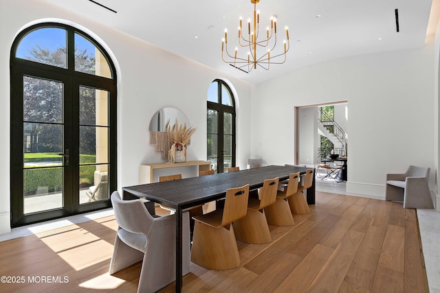 27 N Ward Ave, Rumson, NJ 07760 - dining space featuring french doors, a chandelier, and light wood finished floors