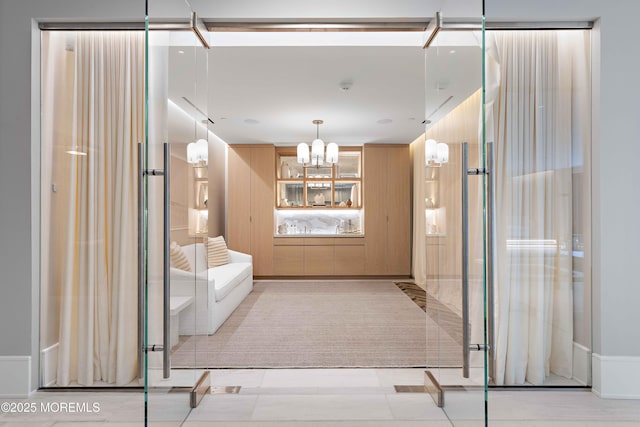27 N Ward Ave, Rumson, NJ 07760 - hallway with a chandelier