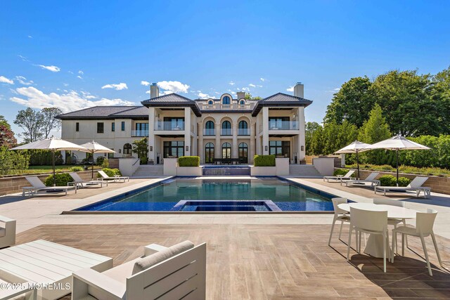27 N Ward Ave, Rumson, NJ 07760 - view of pool with a patio and a pool with connected hot tub