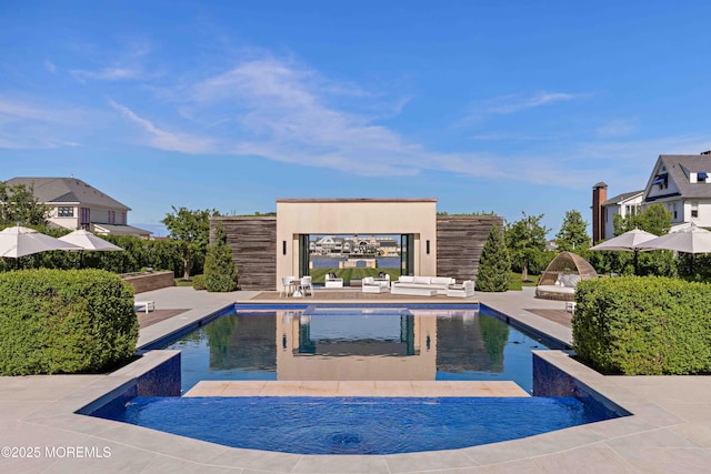 27 N Ward Ave, Rumson, NJ 07760 - swimming pool with a patio, outdoor lounge area, and an in-ground hot tub