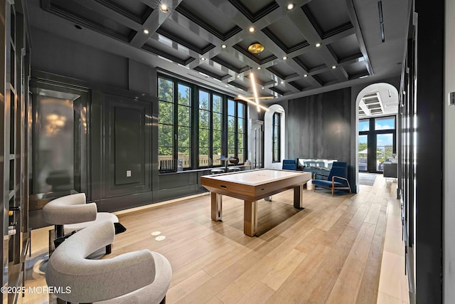 27 N Ward Ave, Rumson, NJ 07760 - playroom with a high ceiling, arched walkways, coffered ceiling, beamed ceiling, and light wood-type flooring