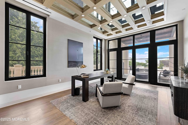 27 N Ward Ave, Rumson, NJ 07760 - living area featuring a towering ceiling, coffered ceiling, healthy amount of natural light, hardwood / wood-style flooring, and beam ceiling