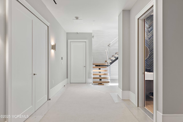 27 N Ward Ave, Rumson, NJ 07760 - corridor with stairs, baseboards, and carpet flooring