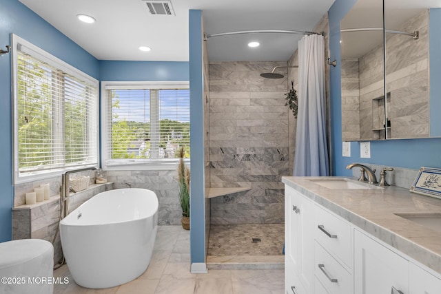 7 Beach Blvd, Highlands, NJ 07732 - full bathroom with tiled shower, a freestanding bath, marble look tiles, recessed lighting, and double vanity