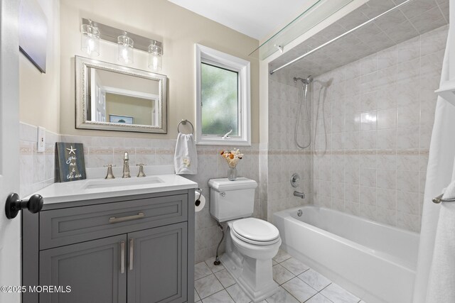 7 Beach Blvd, Highlands, NJ 07732 - full bath with tile walls, washtub / shower combination, toilet, and vanity