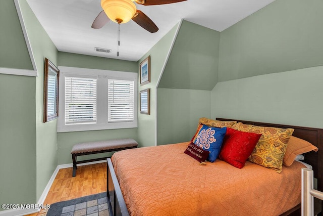 1102 5th Ave, Asbury Park, NJ 07712 - bedroom with wood finished floors, a ceiling fan, and baseboards