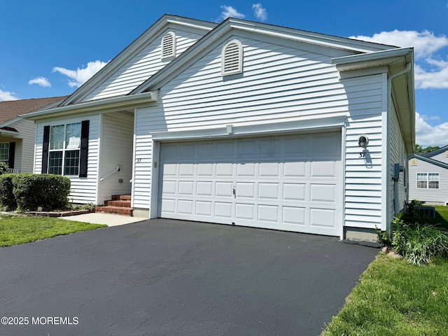 37 Tennyson Rd, Brick, NJ 08724 - ranch-style home with a garage and driveway