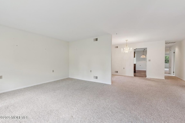 1524 Quince Pl, Toms River, NJ 08755 - carpeted spare room with a chandelier and baseboards