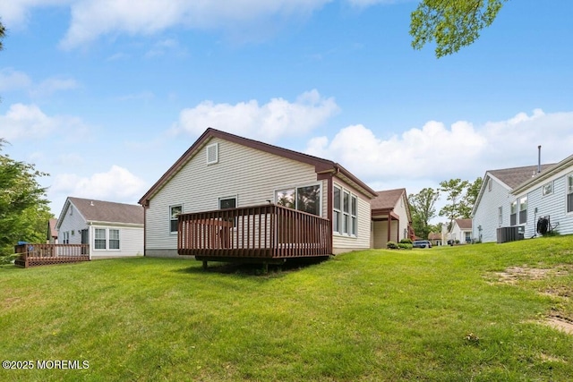 1524 Quince Pl, Toms River, NJ 08755 - rear view of house featuring a wooden deck, central air condition unit, and a lawn